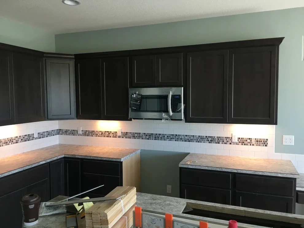 New Home Construction Transition | Cabinetry, Backsplash, and Countertops by DunRight Construction LLC - Photo 4