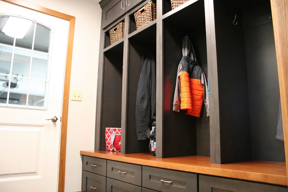 Storage and Laundry Area by Kitchens Inc. - Photo 8