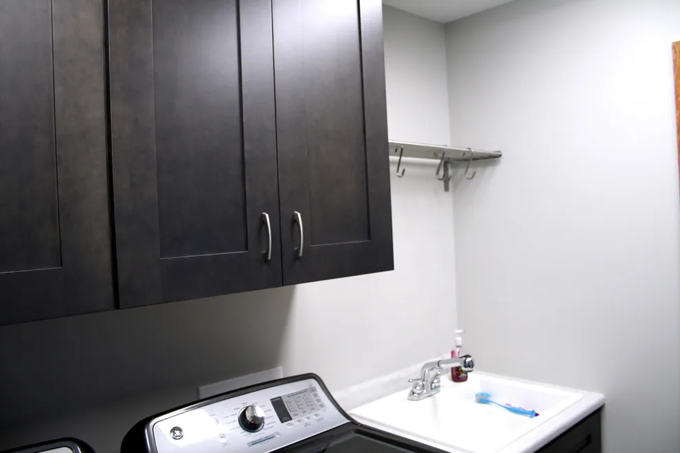 Storage and Laundry Area by Kitchens Inc. - Photo 2