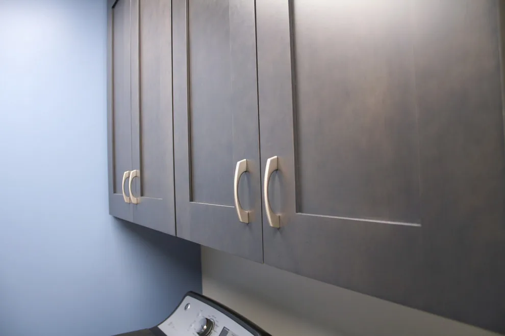 Storage and Laundry Area by Kitchens Inc. - Photo 5