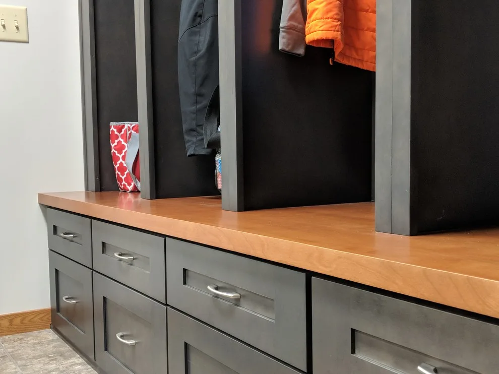 Storage and Laundry Area by Kitchens Inc. - Photo 9
