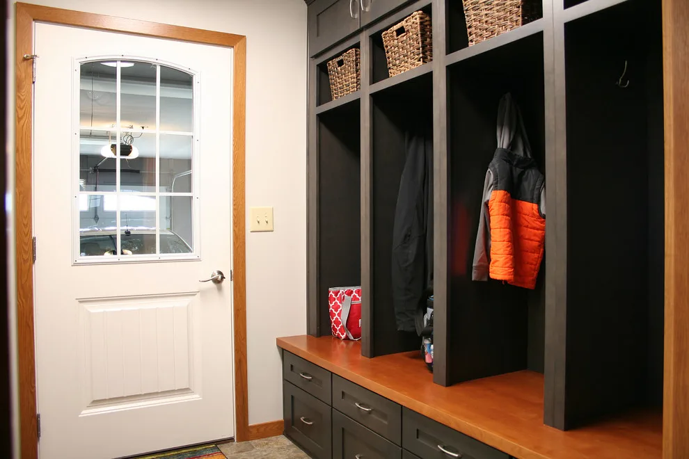 Storage and Laundry Area by Kitchens Inc. - Photo 11