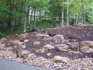 Natural Stone Hardscaped Driveway by True North Landscaping - Photo 2