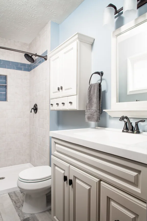 Charming Azure Restroom by HC Remodel & Design - Photo 4