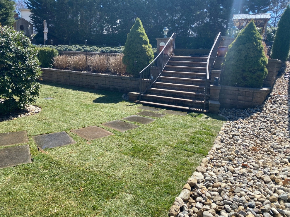 Backyard Grading - (Before & After) by Truesdale Nursery & Landscape Services - Photo 4