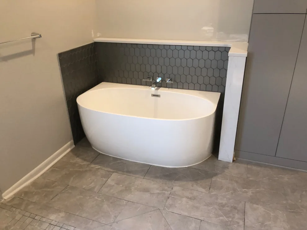 primary bath, half bath, kitchen by Spencer Remodeling - Photo 20