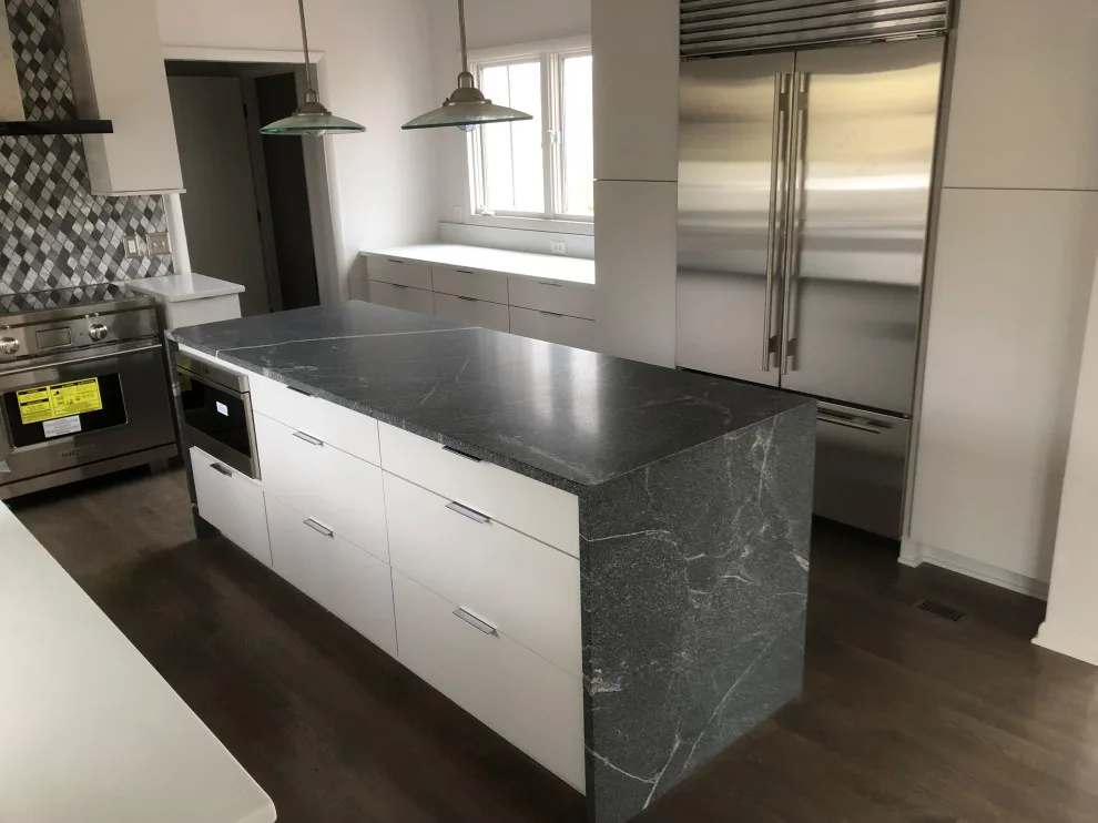 primary bath, half bath, kitchen by Spencer Remodeling - Photo 14