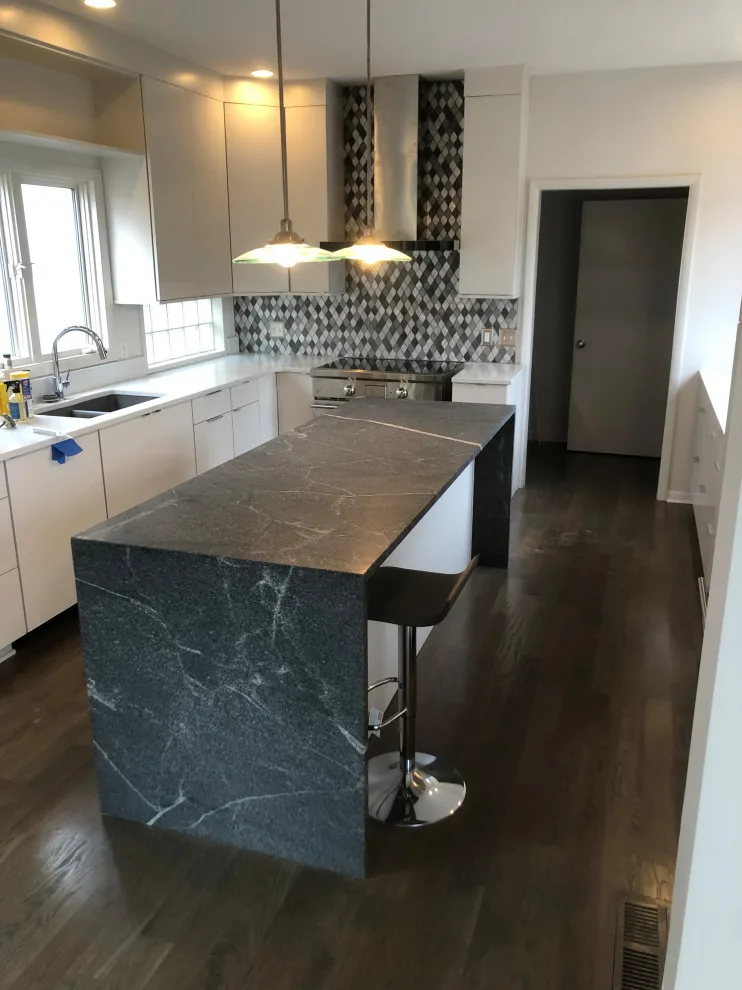 primary bath, half bath, kitchen by Spencer Remodeling - Photo 18