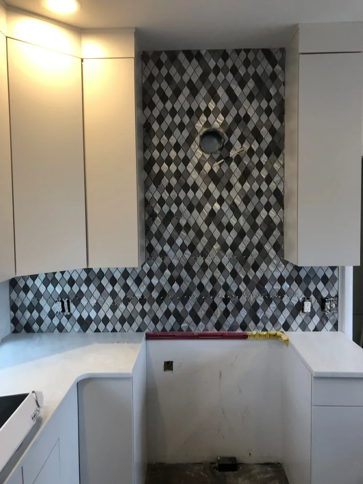 primary bath, half bath, kitchen by Spencer Remodeling - Photo 11