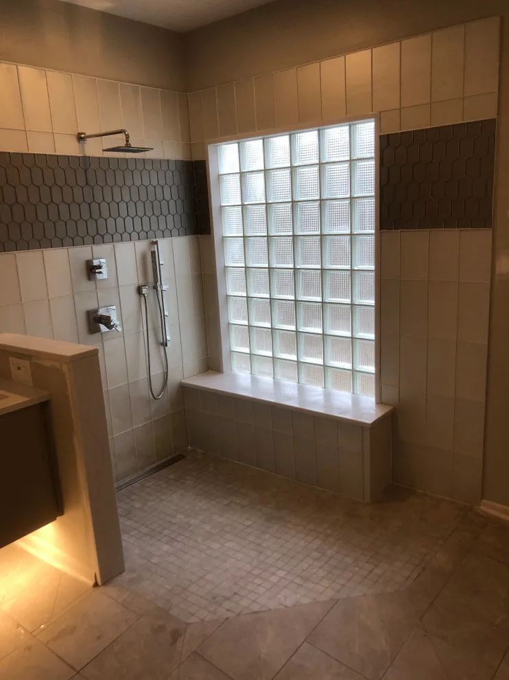 primary bath, half bath, kitchen by Spencer Remodeling - Photo 10