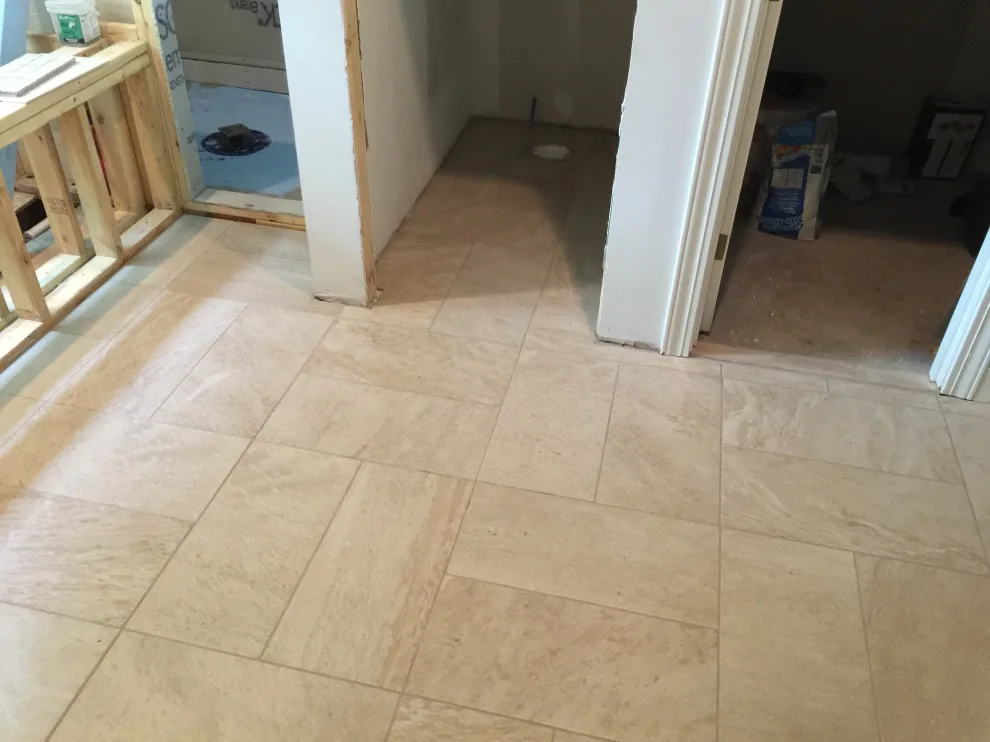 primary bathroom flooring by Spencer Remodeling - Photo 2