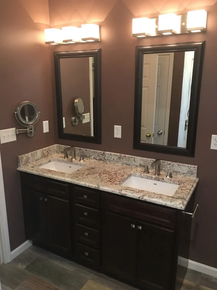 Primary bathroom and new hallway bath flooring by Spencer Remodeling - Photo 8