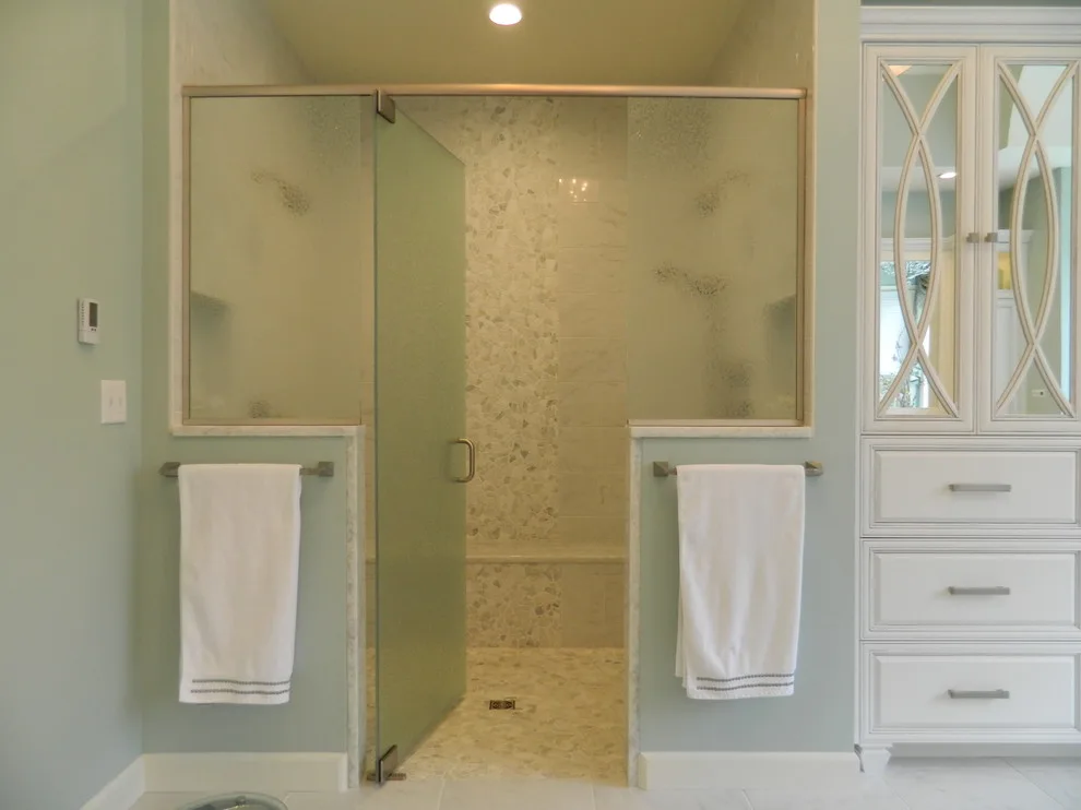 Master Bath with Reflective Cabinets by Lorrien Homes & Remodeling - Photo 2