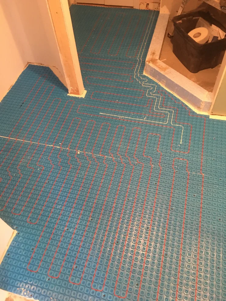 Luxury bathroom featuring heated flooring by Spencer Remodeling - Photo 2