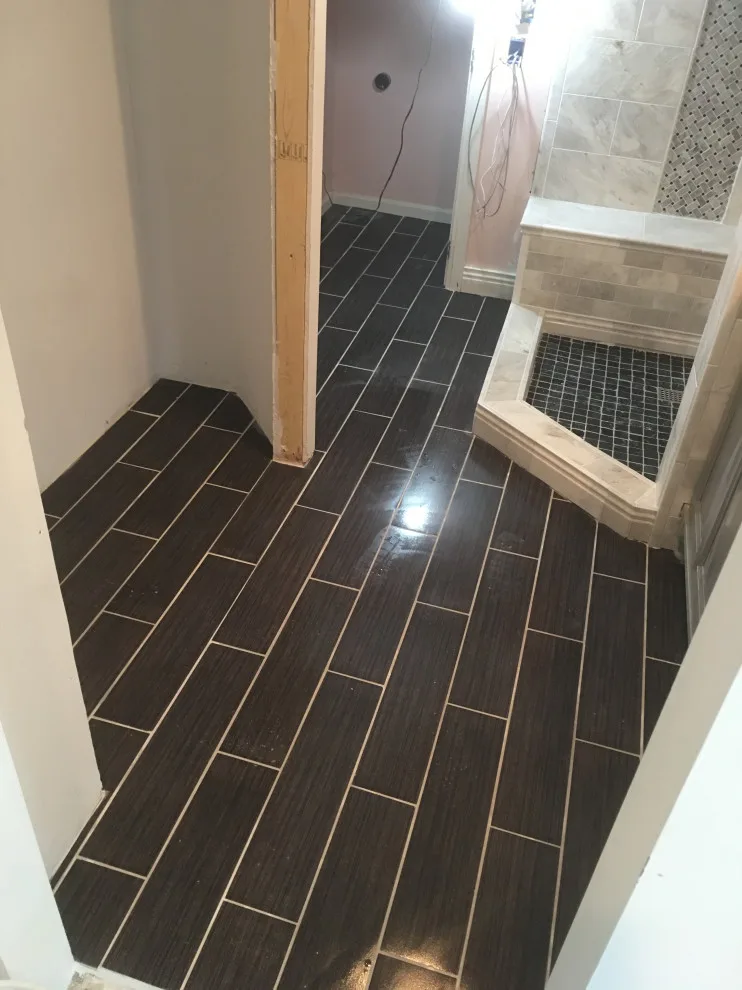 Luxury bathroom featuring heated flooring by Spencer Remodeling - Photo 4