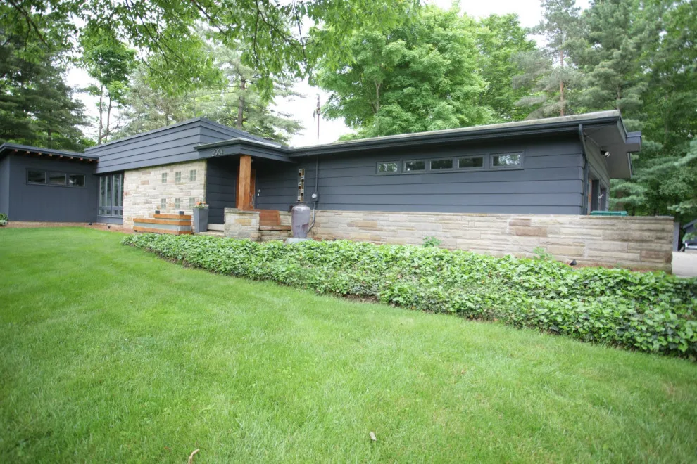 Contemporary Garage Extension in Mid-Century Style by Home Sweet Home Remodeling - Photo 5