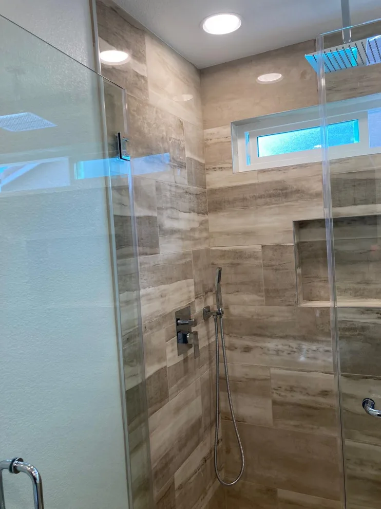 Simplistic Shower Renovation by Home Design Construction - Photo 2