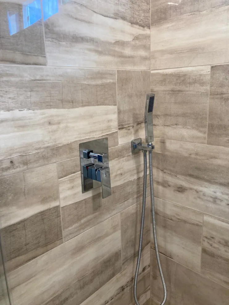 Simplistic Shower Renovation by Home Design Construction - Photo 3