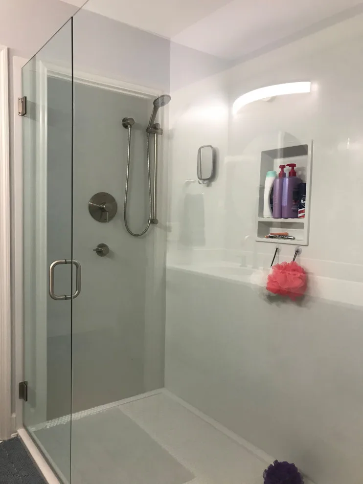 Contemporary Bathroom Renovation by Kitchen Gallery LLC - Photo 3