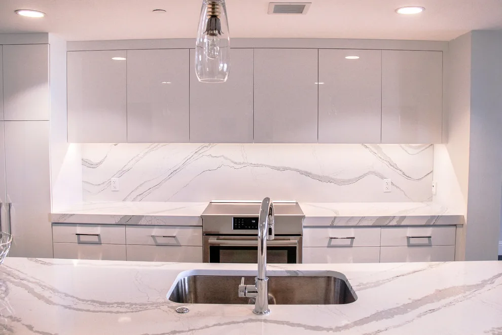 Contemporary Kitchen Revamp in White Acrylic by Kitchen Solvers Of The Gulf Coast - Photo 15
