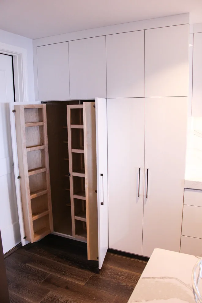 Contemporary Kitchen Revamp in White Acrylic by Kitchen Solvers Of The Gulf Coast - Photo 13