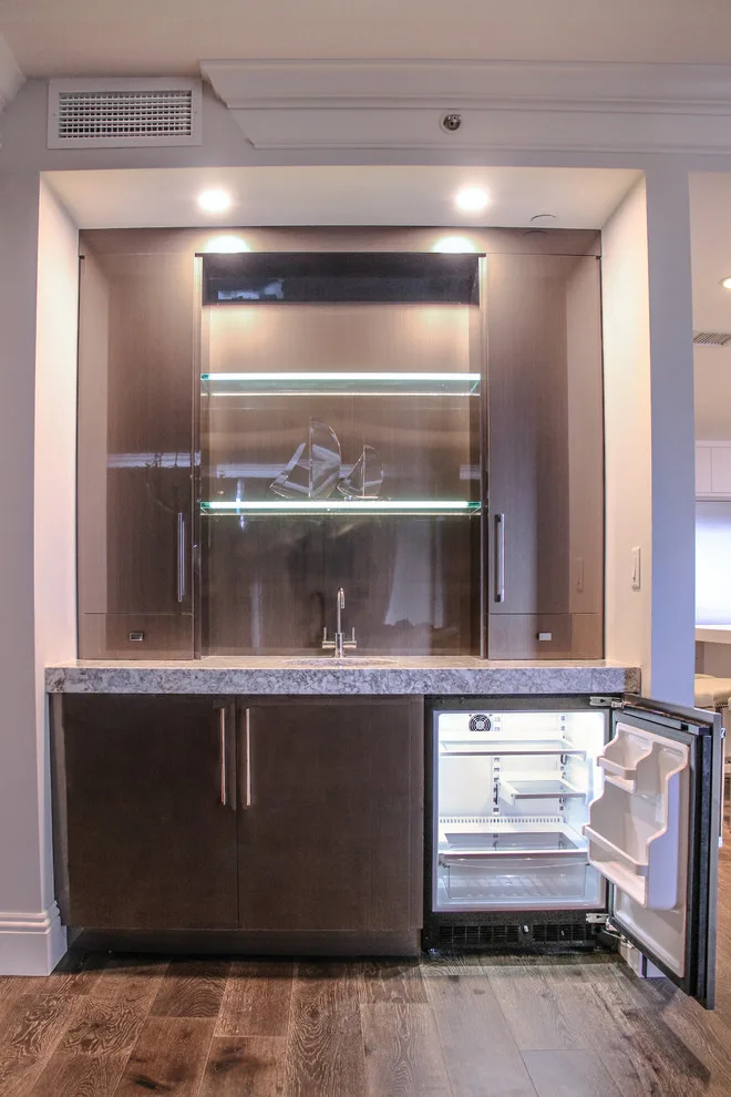 Contemporary Kitchen Revamp in White Acrylic by Kitchen Solvers Of The Gulf Coast - Photo 7