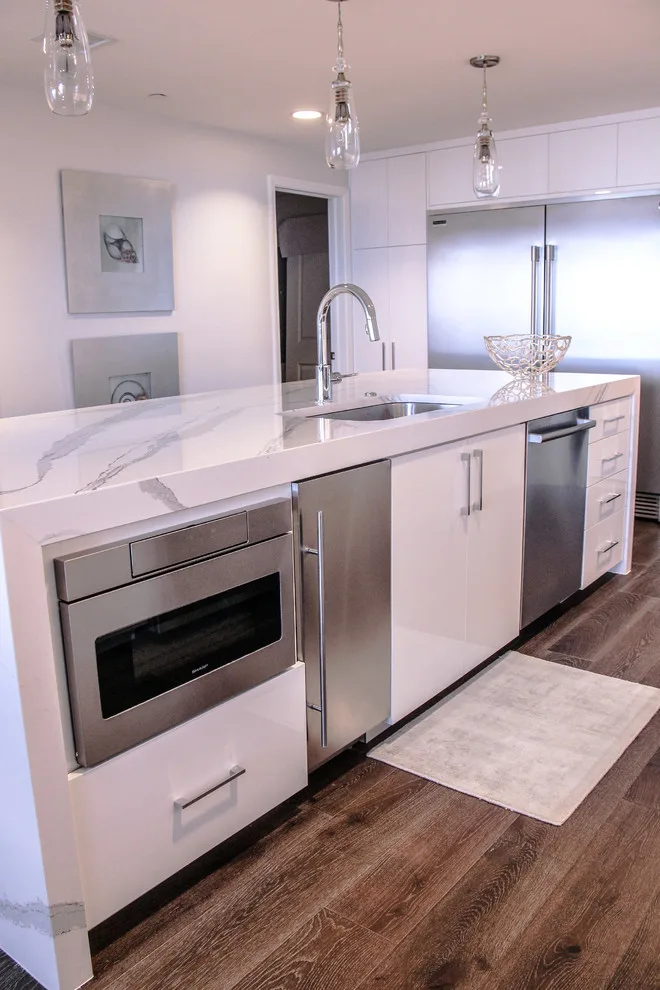 Contemporary Kitchen Revamp in White Acrylic by Kitchen Solvers Of The Gulf Coast - Photo 10