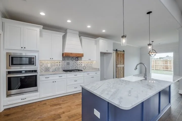 Moroccan-Themed Kitchen Backsplash by America's Best Carpet And Tile - Photo 3