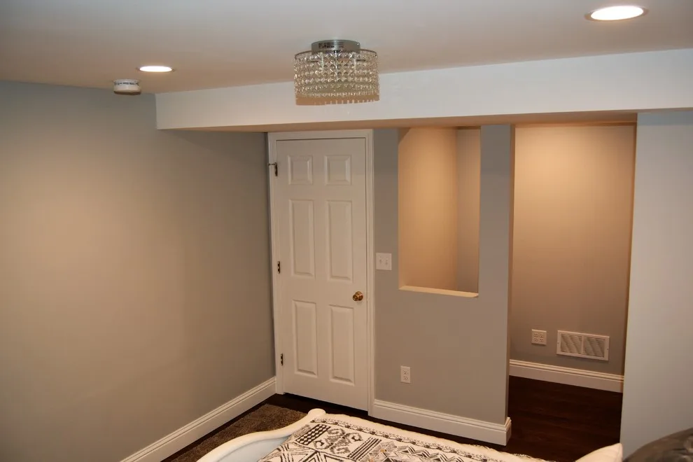 Lower Level Sleeping and Bath Area by Mahn Custom Homes And Renovations - Photo 16
