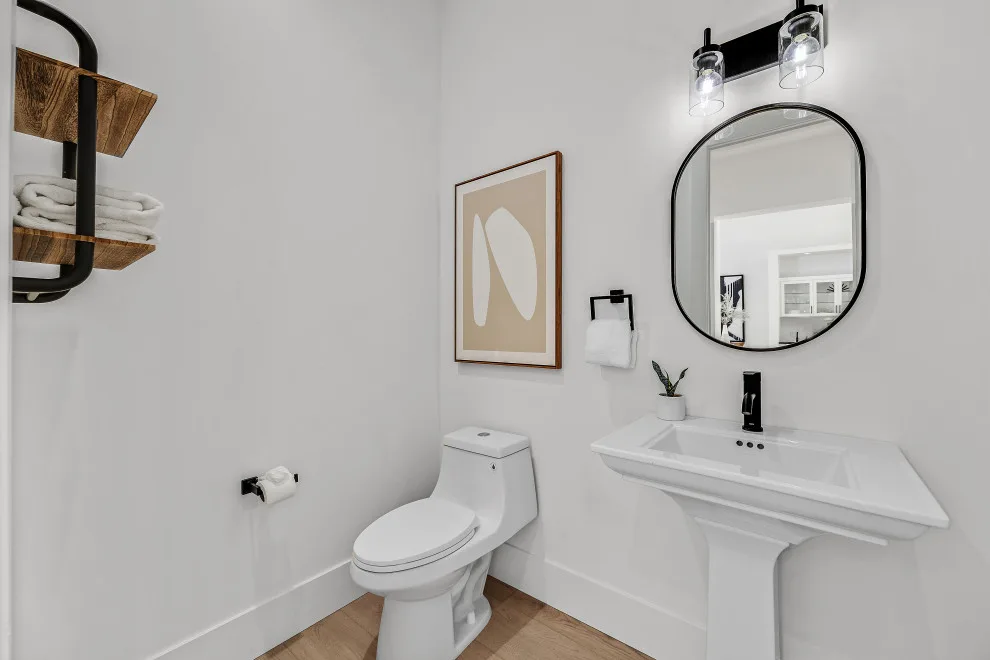Restroom by REI Signature Homes Inc. - Photo 4