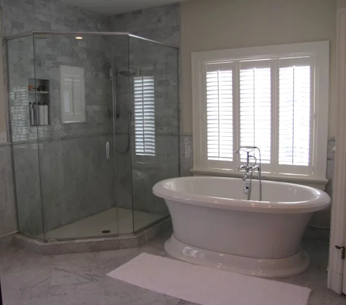 Restrooms by Mahn Custom Homes And Renovations - Photo 12