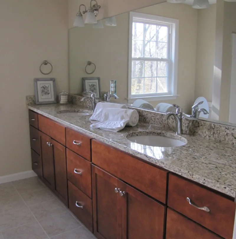 Restrooms by Mahn Custom Homes And Renovations - Photo 13