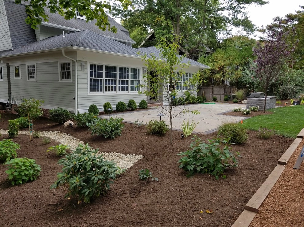Irregular Blue Stone Patio with cobble border by Z.O. Landscaping - Photo 4