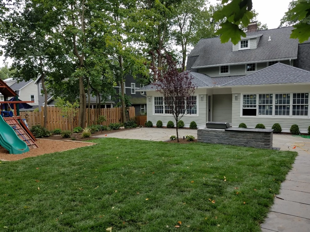 Irregular Blue Stone Patio with cobble border by Z.O. Landscaping - Photo 6