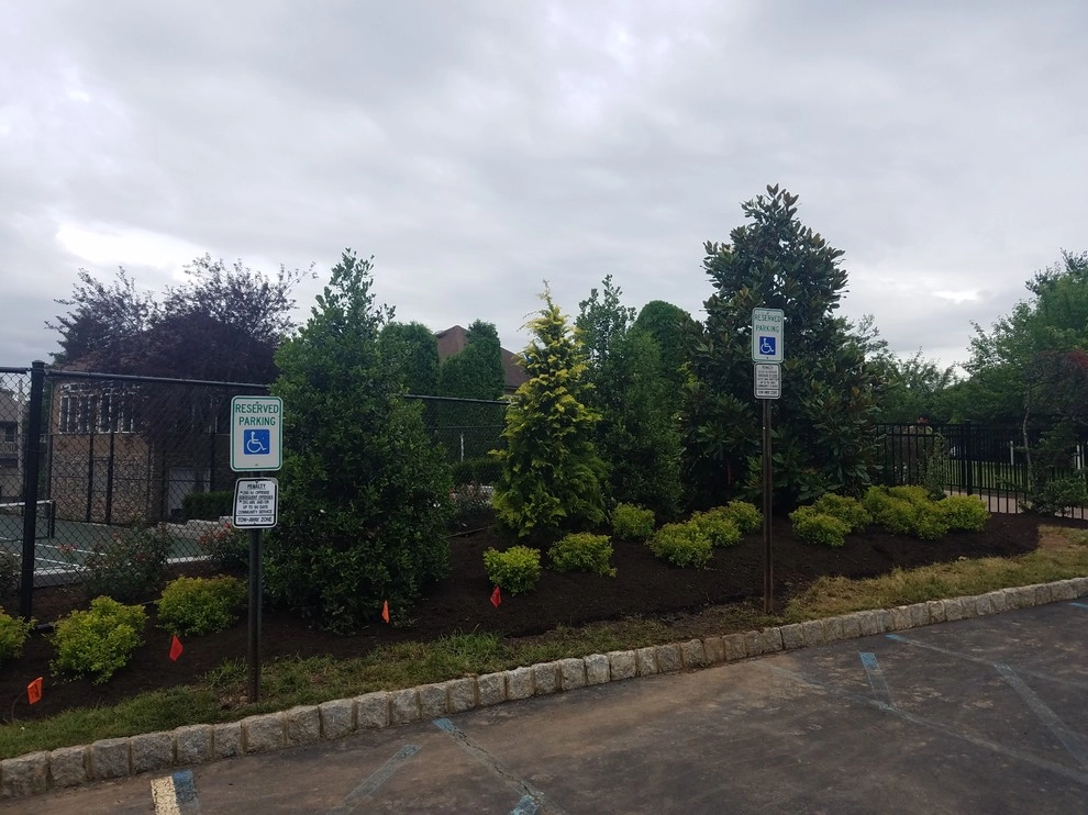 Tennis court landscape design by Z.O. Landscaping - Photo 11