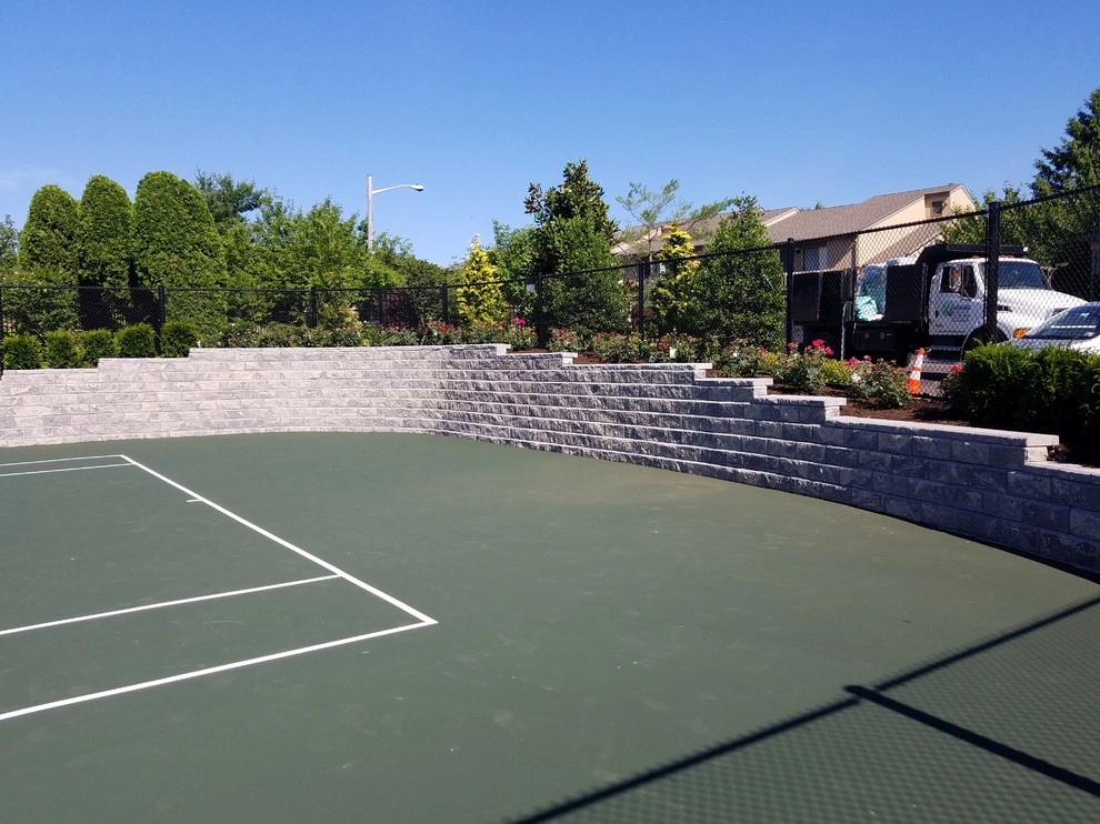Tennis court landscape design by Z.O. Landscaping - Photo 2