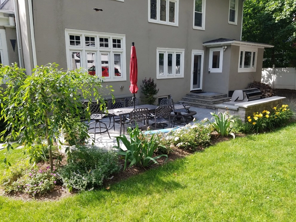 Maplewood expanded side patio with water feature by Z.O. Landscaping - Photo 8