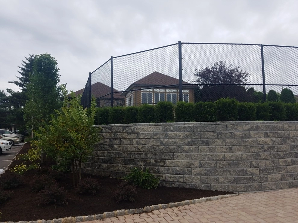 Tennis court landscape design by Z.O. Landscaping - Photo 8