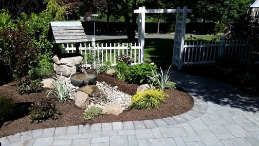 Maplewood expanded side patio with water feature by Z.O. Landscaping - Photo 5