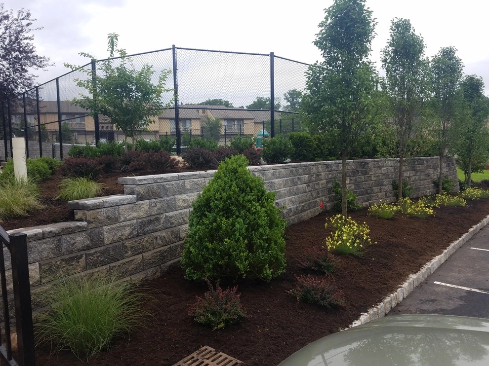 Tennis court landscape design by Z.O. Landscaping - Photo 10