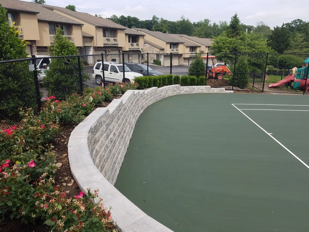 Tennis court landscape design by Z.O. Landscaping - Photo 3
