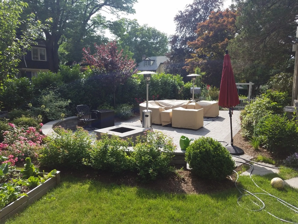 Maplewood expanded side patio with water feature by Z.O. Landscaping - Photo 2