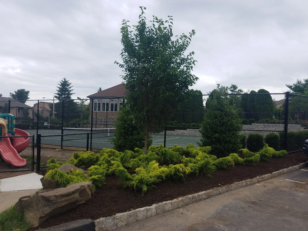 Tennis court landscape design by Z.O. Landscaping - Photo 5