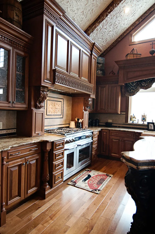 Elegant bespoke kitchen by Cornerstone Builders Of Terre Haute, Inc. - Photo 35