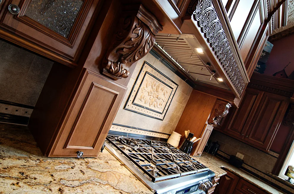 Elegant bespoke kitchen by Cornerstone Builders Of Terre Haute, Inc. - Photo 15