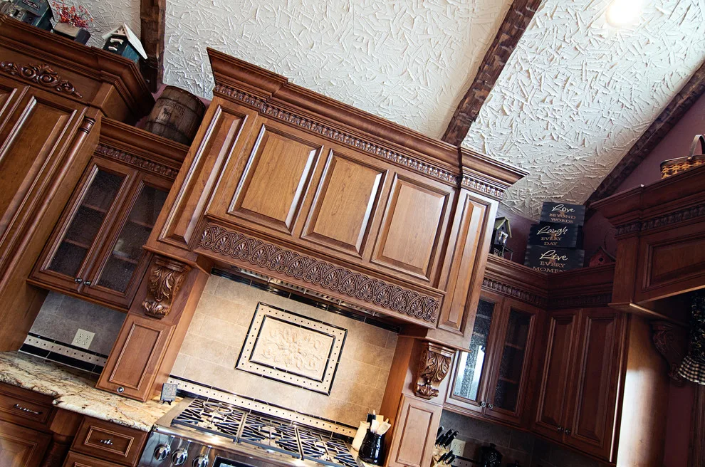 Elegant bespoke kitchen by Cornerstone Builders Of Terre Haute, Inc. - Photo 76