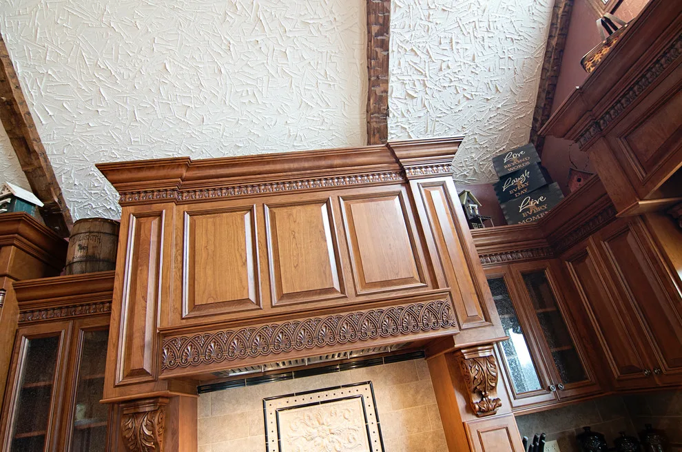 Elegant bespoke kitchen by Cornerstone Builders Of Terre Haute, Inc. - Photo 12