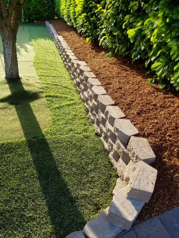 Artificial Turf & Retaining Wall by 4 Seasons Landscaping, LLC - Photo 4