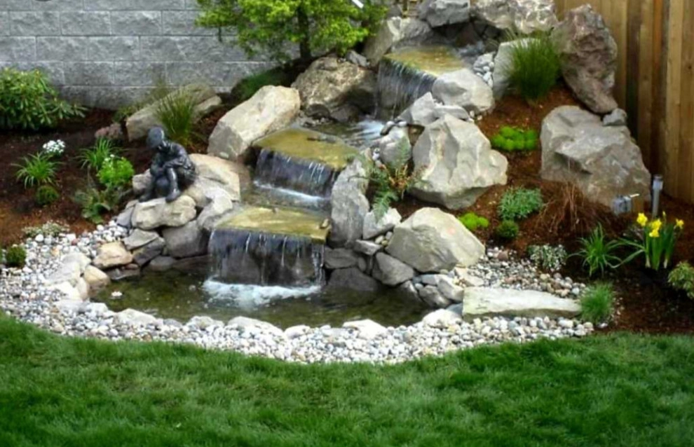 Flagstone, Pavers & Water Pond by 4 Seasons Landscaping, LLC - Photo 7