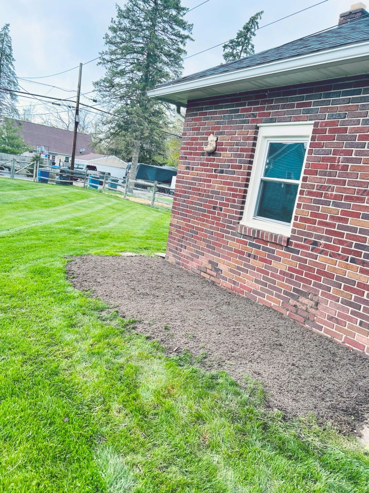 Landscaping and Correcting Grade at Foundation by A+ Equipment Services And Excavation - Photo 4